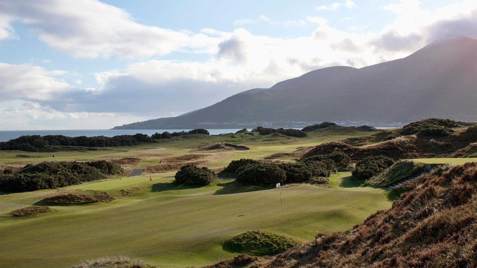 View of Royal County Down Golf Course with mountain backdrop